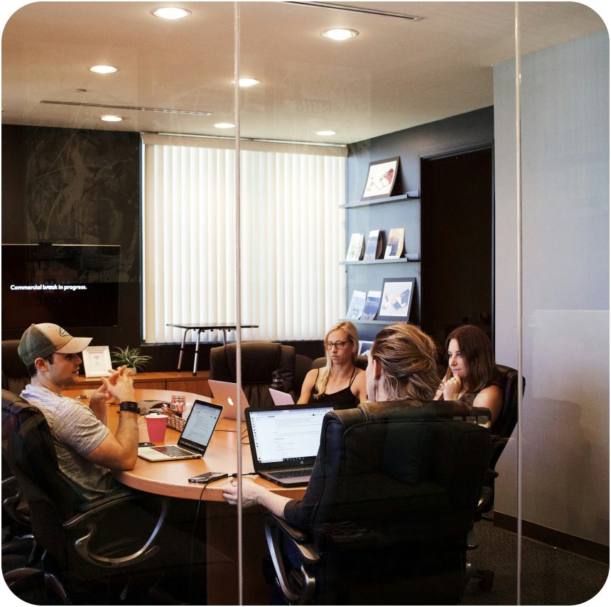 Business team collaborating on AI implementation strategy